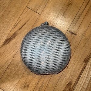 New oval silver clutch